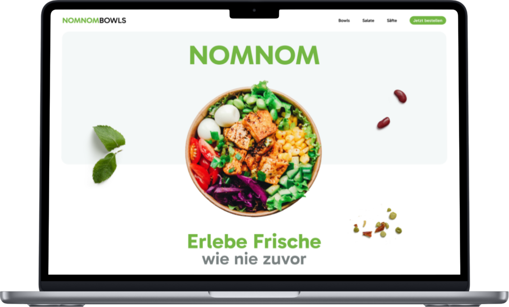 Ein Laptop, auf dem eine Website für ein Restaurant mit dem Foto einer Schüssel mit buntem Gemüse in der Mitte zu sehen ist.